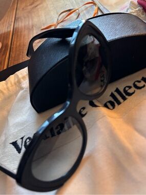 PRADA Gloss Black Oval Cat-Eye Sunglasses w/ Case.